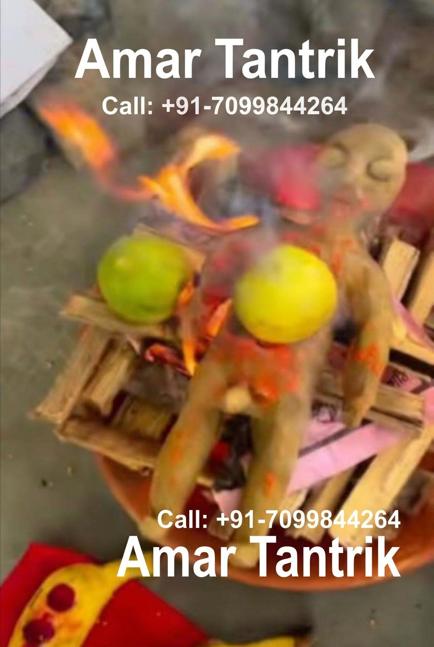 Havan offering with fruit and wood arranged in a clay vessel