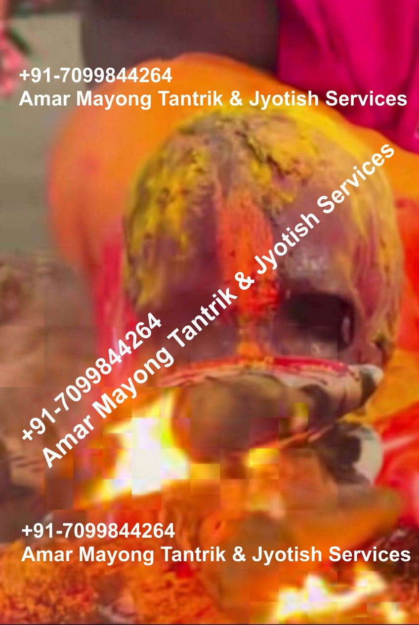 Turmeric and vermilion offerings during a traditional Jyotish rite in Mayong